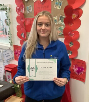 Lily with her Apprentice of the Year certificate